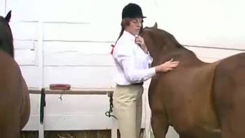 Cheeky MILF stuffs huge horse dick into her soaked openings